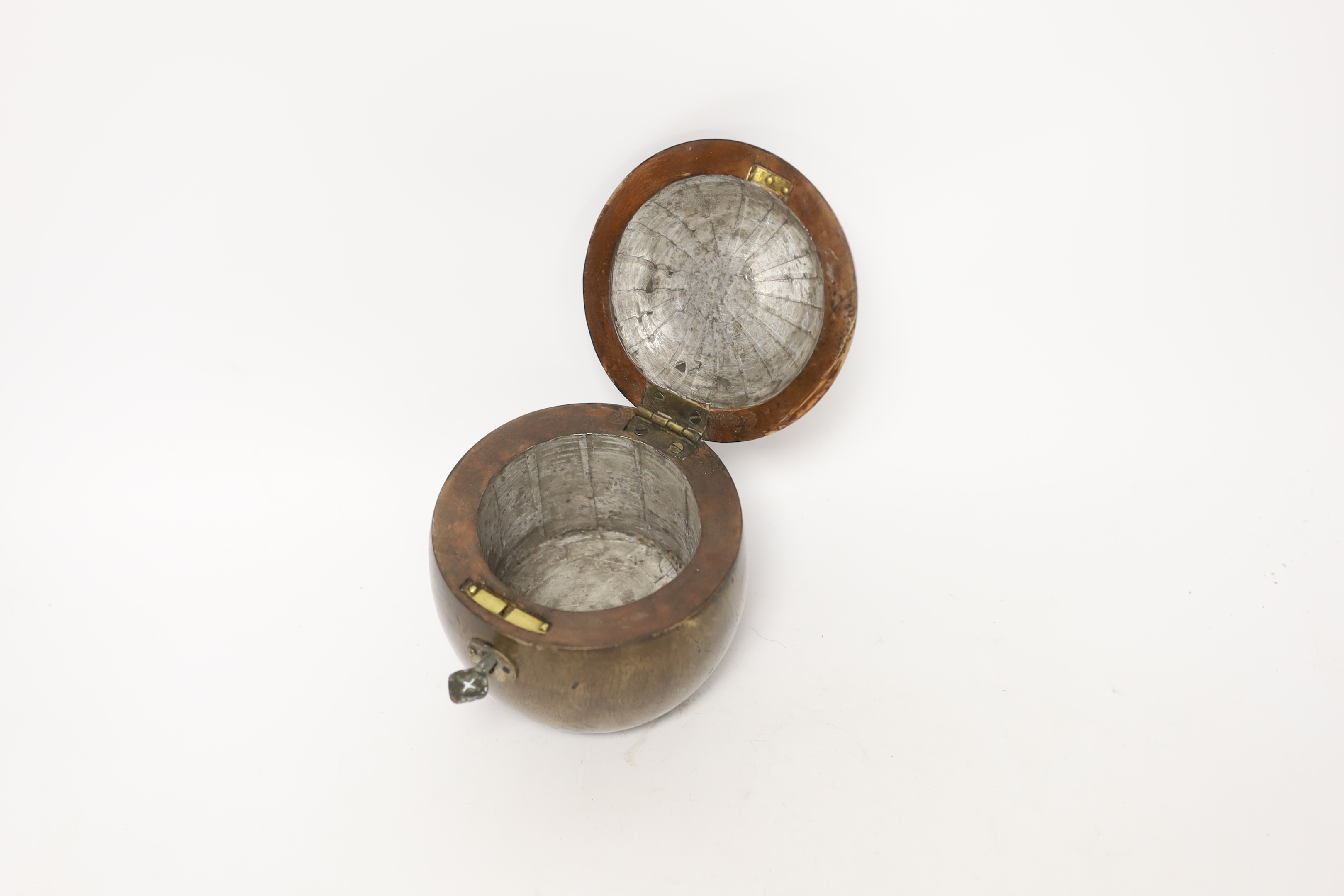A treen apple shaped tea caddy, in George III style, 10cm high